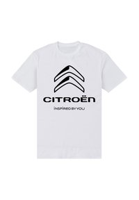 Bílý bavlněný tričko s černým logem Citroën a textem "INSPIRUJENO TEBOU" v tučném, jednoduchém písmu pod logem.