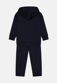 Champion GRAPHIC HOODED FULL ZIP SUIT UNISEX SET - Vetoketjullinen college - dark blue