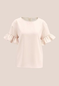 Blasse rosa Bluse mit rundem Halsausschnitt und kurzen Ärmeln, die mit Rüschenakzenten verziert ist. Glattes Material und Reißverschluss im Rücken.