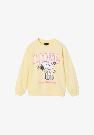 Hellgelber Pullover mit Snoopy, der Woodstock umarmt, umgeben von pinkfarbenen Herzen, und darüber steht in großen pinkfarbenen Buchstaben "LOVE".