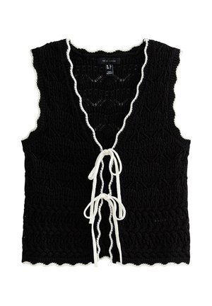 Czarna szydełkowana kamizelka bez rękawów z białym falistym wykończeniem i dwoma białymi wiązaniami na przodzie.