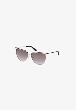 Cat-eye sunglasses with gradient gray lenses, gold metal frame, black accents on temples, and orange detailing at the top corners.