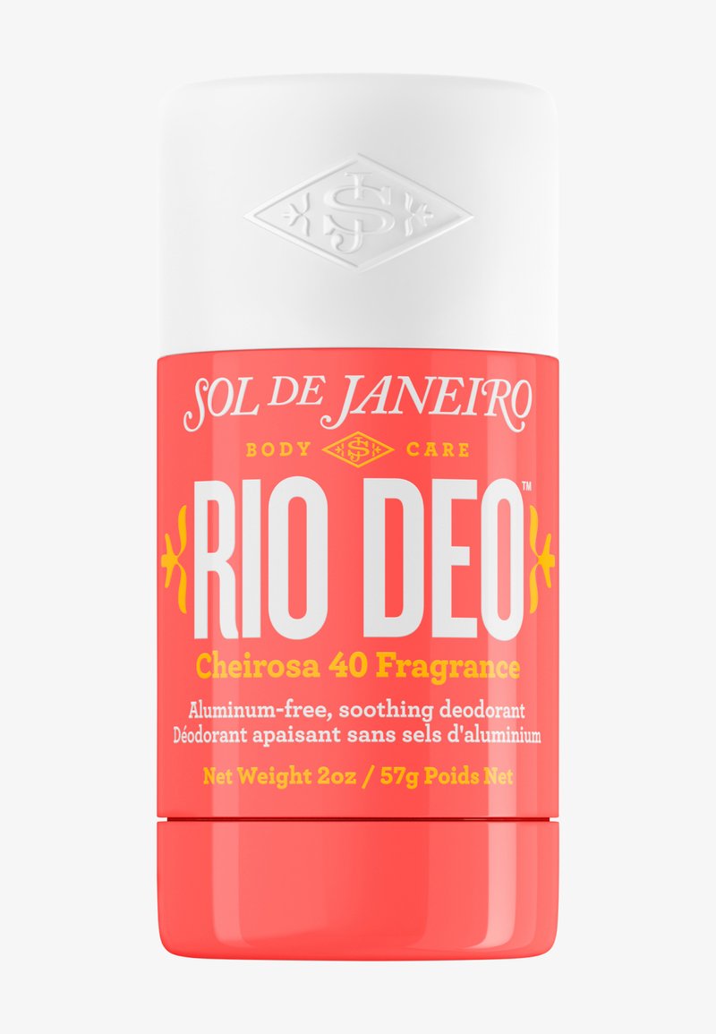 Sztyft dezodorantu Sol de Janeiro Rio Deo z zapachem Cheirosa 40, bez aluminium, łagodzący, 2 oz, opakowanie koralowo-białe.