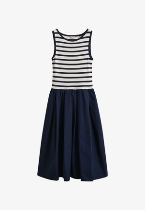 Robe sans manches avec corsage à rayures horizontales bleu marine et blanc et jupe unie bleu marine froncée.