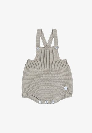 Romper per neonati lavorato a maglia in beige, con bretelle regolabili, texture a coste e bottoni bianchi lungo il fondo per la chiusura.