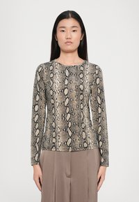 Long-sleeve top featuring a snake print pattern in muted beige and black. Smooth texture with a round neckline and fitted silhouette.