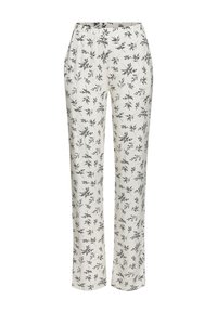 Baltās bikses ar melnu ziedu rakstu, elastīgu jostu, garu piegriezumu un gludu, vieglu auduma tekstūru.