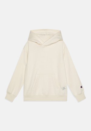 Krēmveida kapuce, izgatavota no mīkstas kokvilnas. Pieder kangaroo kabata, ribotie piedurknes un logo uz piedurknes. Ikdienas, brīvs dizains.