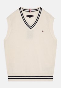 Gilet senza maniche color crema con scollo a V, texture a coste e strisce navy al collo e all'orlo. Piccolo logo sul davanti.