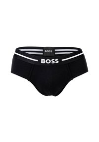 Schwarze Baumwollslips mit einem breiten elastischen Bund, der mit weißen Streifen und dem "BOSS"-Logo in der Mitte vorne versehen ist. Weiche, glatte Textur.