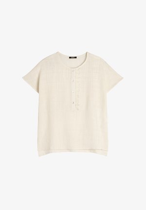 Jasno beżowa bluzka z krótkim rękawem, wykonana z fakturowanej tkaniny, z okrągłym dekoltem i listwą z pięcioma okrągłymi guzikami, z delikatnym falbankowym wykończeniem.