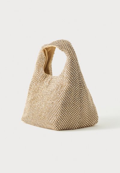 Bežna tkaninska torba, prekrita z majhnimi biseri, s kratkim, zaobljenim ročajem in mehkim, nestrukturiranim obliko.