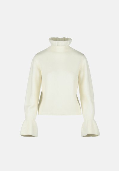 Krämfärgad ribbad stickad tröja med volangkrage och utställda manschetter på långa ärmar, enkel och elegant design.