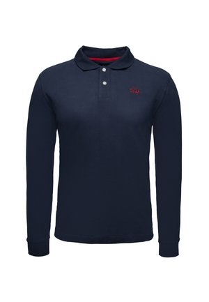 Tummansininen pitkähihainen polo-paita puuvillasta, jossa on kaulus, kahden napin avaus ja punainen brodeerattu logo rinnassa. Pehmeä tekstuuri.