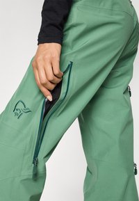 Norrøna LOFOTEN PANTS - Suusapüksid - dark ivy