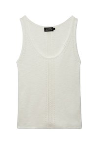 Débardeur en coton blanc avec un col en rond et des coutures verticales texturées. Design simple, sans accents ni motifs supplémentaires.