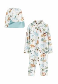 Conjunto para niños que incluye un body de manga larga y un gorro a juego. Tela blanca con patrones coloridos de animales y palmeras. Textura suave.
