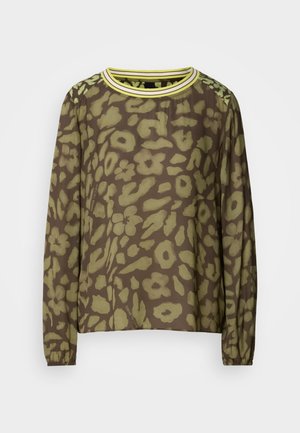 Long-sleeve brown top featuring a green abstract floral pattern, round neckline with yellow stripes, and elasticated cuffs.