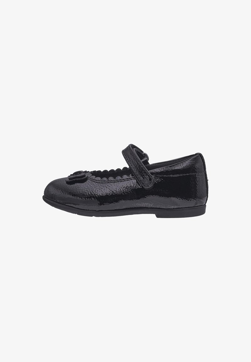 Chaussure Mary Jane en cuir verni noir avec bord festonné et détail fleur sur l’orteil, bride de fermeture sur le dessus.