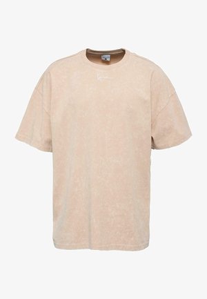 Löwengatest, lühikeste varrukatega, kerge beež T-särk, millel on tekstureeritud pind. Omab ümmargust kaelust ja diskreetset valget logo detaili rinnal.