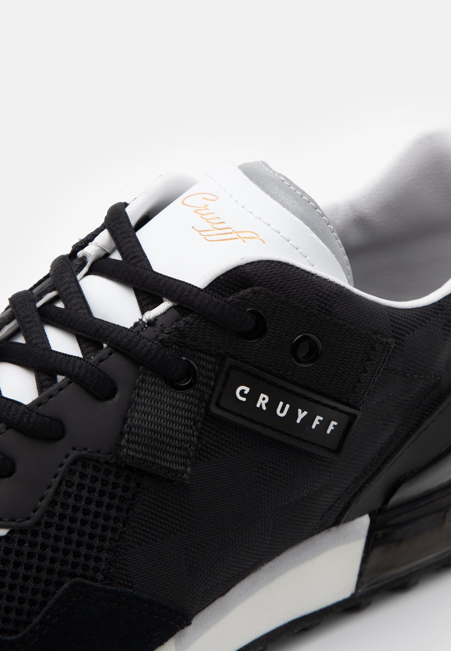 black cruyff trainers