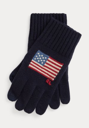 Gants tricotés bleu marine avec un motif texturé représentant le drapeau américain. Le drapeau comporte des bandes rouges et blanches ainsi que des étoiles bleues et blanches.