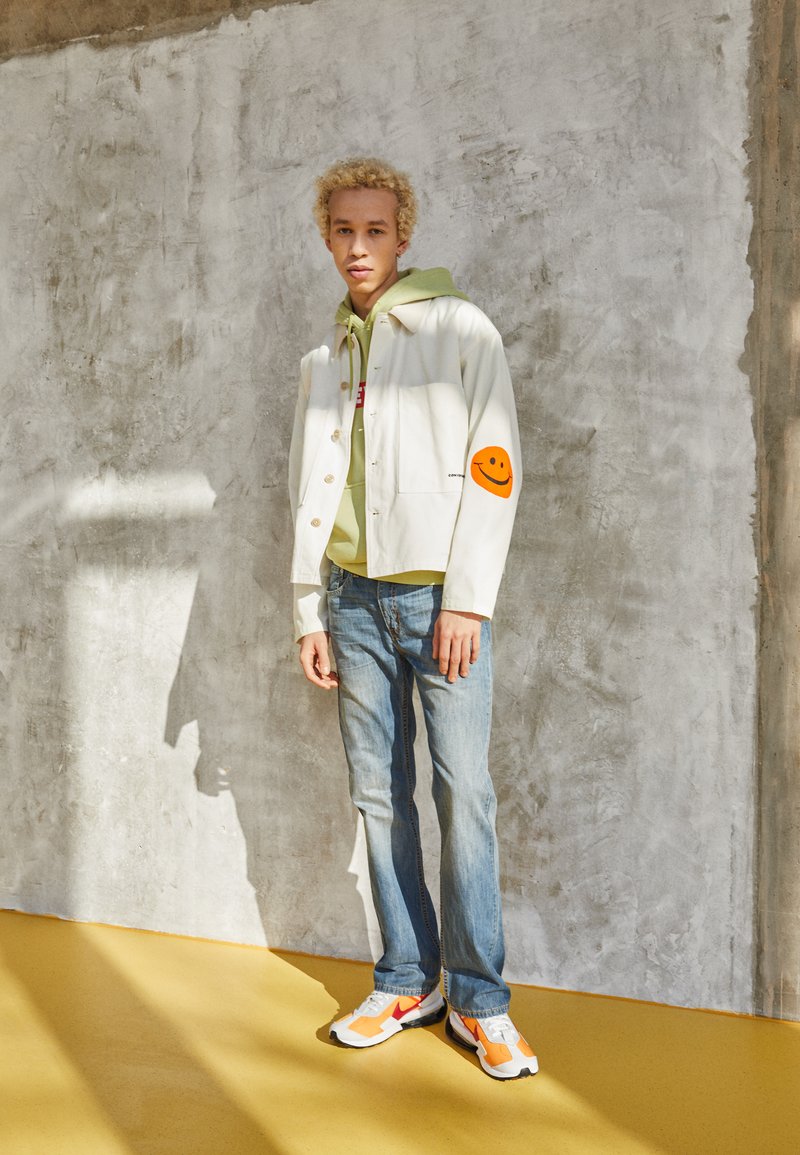 Levi's® 527™ SLIM BOOTCUT - Calças de ganga justas - medium chipped