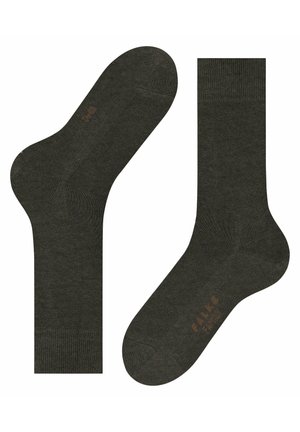 Dark green socks made of textured fabric, featuring reinforced toe and heel areas, with subtle branding in a lighter shade.