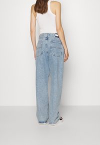 Tommy Jeans Džíny Relaxed Fit - light-blue denim