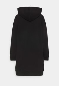 Musta hupparimekko, jossa on pitkät hihat ja rento istuvuus. Pehmeä kangas, ribbireunukset hihoissa ja helmassa, yksinkertainen muotoilu.