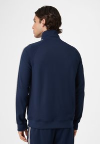 Fila APPAREL BIELLA REGULAR TAPED TRACK  - Træningsjakke - black iris