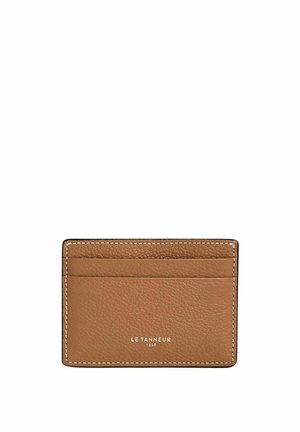 Brown leather card holder with four card slots, contrasting stitching, and embossed logo; smooth texture and minimalist design.