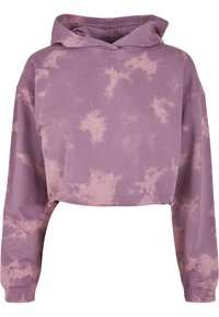 Krátka mikina vo svetlo fialovej farbe s tie-dye vzorom. Má dlhé rukávy a kapucňu so šnúrkou, vyrobená z mäkkého bavlneného materiálu.
