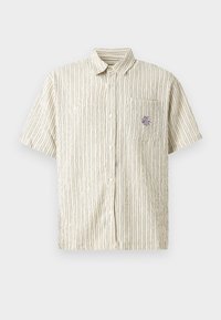 Kortsleeve knappskjorte i kremfarge med vertikale mørke striper. Har en lomme med et lilla brodert design. Tekstuert stoff.