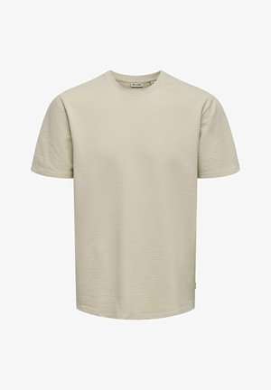 Jasnobeżowa koszulka z krótkim rękawem z teksturowanej tkaniny z okrągłym dekoltem. Prosty design, bez widocznych wzorów czy akcentów.