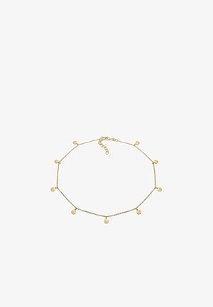 Bracelet de cheville en chaîne d'or délicat avec huit petites breloques rondes, réparties uniformément, avec une fermeture à boucle réglable.
