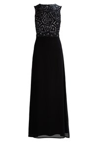 Ärmlös svart aftonklänning med en golvlång kjol och en kraftigt pärlbroderad geometrisk mönstrad bodice.