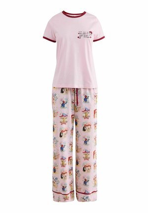 Light pink short-sleeve pajama set with red trim, featuring a small text and heart design on the top and multicolored cartoon patterns on the pants.