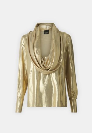 Top metallico oro con scollo drappeggiato, maniche lunghe e una texture liscia e lucida. Presenta una leggera lucentezza e un design dal fit rilassato.