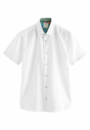 White short-sleeve button-up shirt with a collar, featuring a colorful floral and geometric inner collar detail.