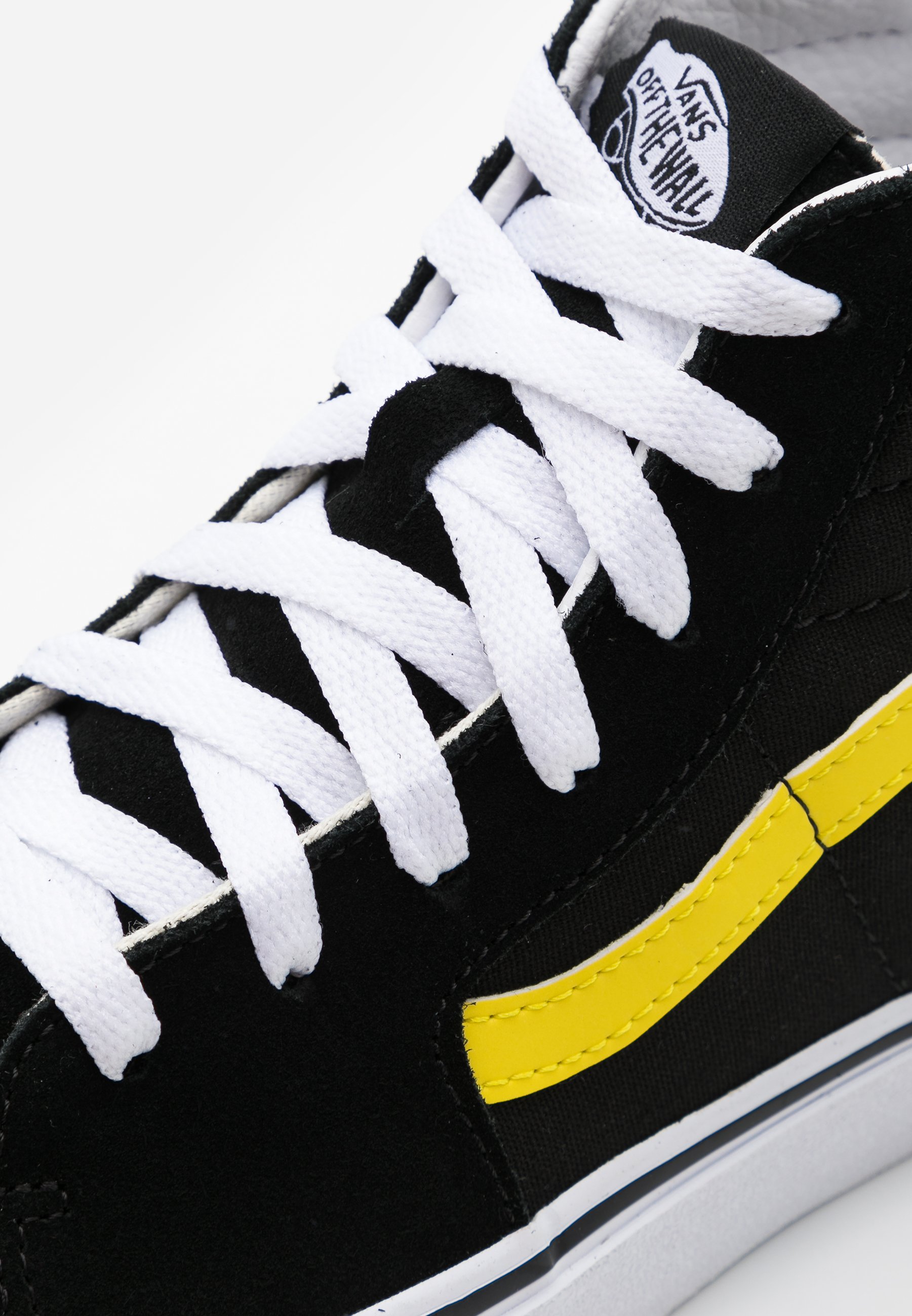 black and yellow vans high tops