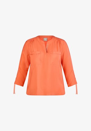 Bright orange blouse with three-quarter sleeves, scoop neckline, two front pockets, and gathered detailing on shoulders and sleeves.
