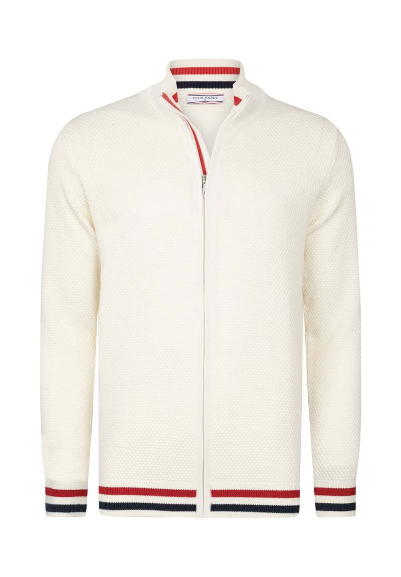 Off-white zip-up cardigan med strukturerad stickad mönster, har röda och marinblå randiga accenter på kragen och ärmarna.