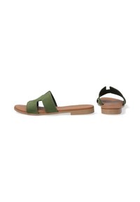 Groene suède slide sandalen met een brede bovenband en uitsnijdingen. Platte bruine rubberen zool. Minimalistische stijl, geschikt voor casual wear.