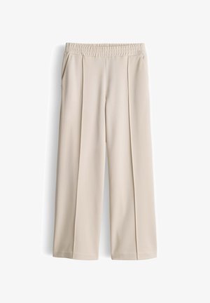 Beige Hosen mit weitem Bein, Falten, elastischem Bund und Seitentaschen, auf weißem Hintergrund gezeigt.