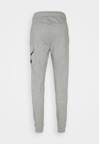 Nike Performance Pantalones deportivos - grey