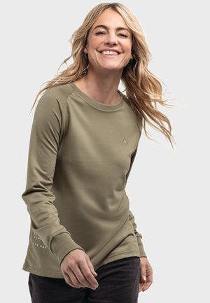 Olivenfarbener Langarmshirt aus weichem Stoff mit rundem Halsausschnitt und gerippten Bündchen, mit einem kleinen Logo auf der oberen linken Seite und Text am Ärmel.