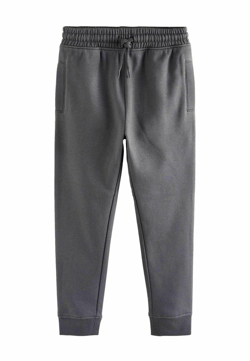 Pantalones de chándal grises con cintura elástica, cordón, bolsillos laterales y puños acanalados. Hechos de material suave y texturizado.