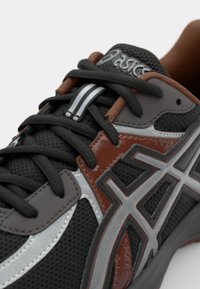 ASICS SportStyle JOG 100S UNISEX - Sportbačiai - black/pure silver