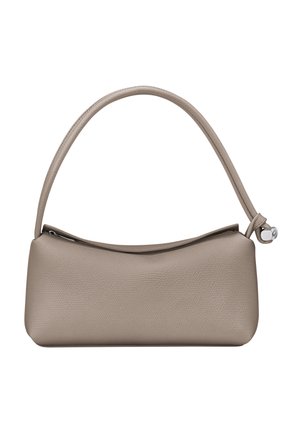 Beige leather handbag with a curved shape, a short handle, and a zip closure. The surface features a textured finish and minimal hardware.